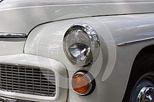 Closeup of front left front of a vintage car