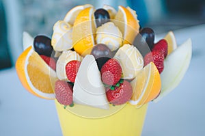 Closeup of fruit bouquet decoration on the dining table