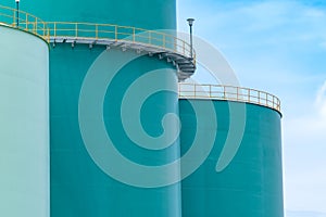 Closeup fuel storage tank in petroleum refinery. Blue big tank of oil storage. Fuel silo. Liquid petroleum tank. Petroleum oil