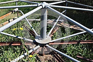 Closeup of the fulcrum of an old merry-go-round