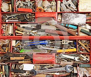 Closeup of a full carpenter toolbox.