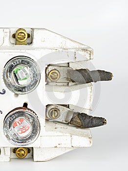 Closeup of a fuse box with fuses inserted