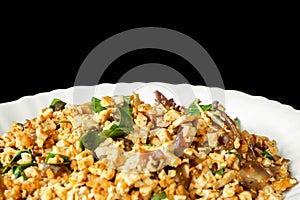 Closeup fusion vegan food in Thai northern style Larp in white ceramic plate