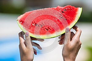 Closeup girl female hands with watermelon