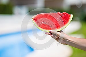 Closeup girl female hands with watermelon