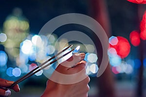 Closeup of Girl with Sparkle. Close up of woman holding sparkler