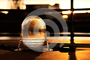 Closeup of a glass plafond for lamp with sunset background