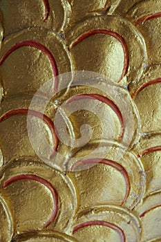 Closeup golden fish scale stucco