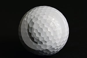 Closeup Golf Ball on Black