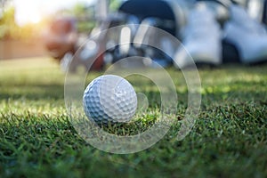 Closeup golf ball on green ready to be shot