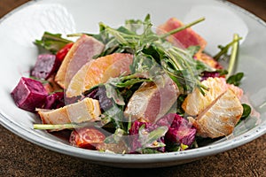 Closeup on gourmet salad with fried tuna