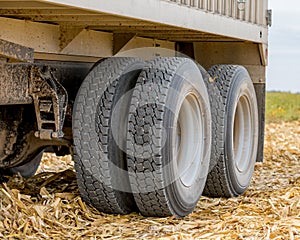 Closeup of grain truck tandem axle wheels