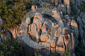 Closeup of granite Aktovo canyon devil`s valley stone pillars,