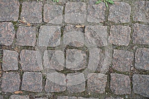Closeup of granite setts road pavement