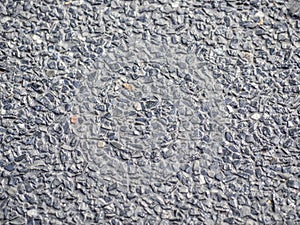 Closeup of gravel and cement floor background