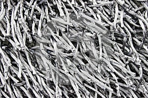 Closeup of gray silver shag material - almost monotone backgroun