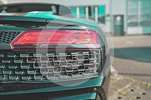 Closeup of green Audi r8 taillight photo