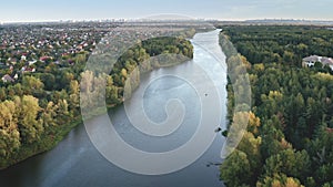 Closeup green forest at river aerial. Nobody nature landscape. Cityscape at leaf tree. Greenery park