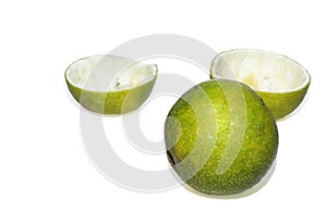 Closeup of Green and yellow Color Mosambi or Sweet lime Fruit isolated on White Background with sliced sweet lemon peels photo