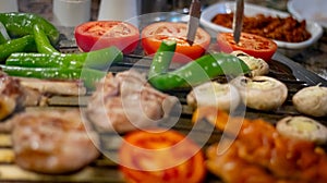 Closeup of grilled chicken kebabs with vegetables