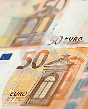 Closeup of a group of fifty euros banknote background