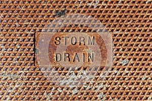 Closeup of a grunge metal surface, storm drain