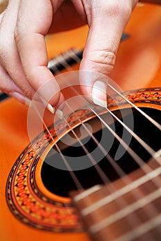 Closeup of a guitarist playing