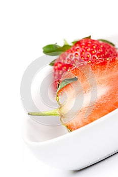 Closeup of a halved fresh ripe strawberry