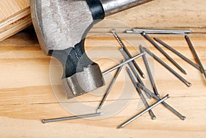 Closeup of hammer and nails photo