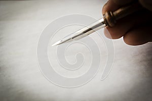 Closeup of hand with fountain pen