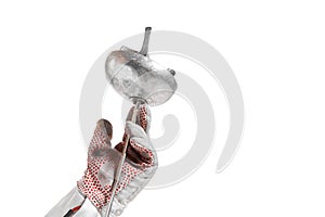 Closeup hand in glove holding fencing sword, rapier isolated on white background