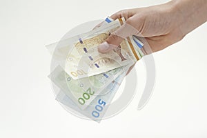 Hand holding danish currency