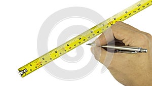 Closeup of hand pointing at a measuring tape on white background