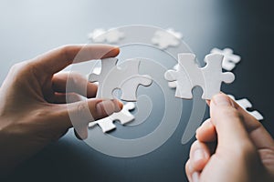 Closeup hand of woman connecting jigsaw puzzle, Business solutions, success and strategy concept