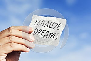 Text legalize dreams in a piece of paper