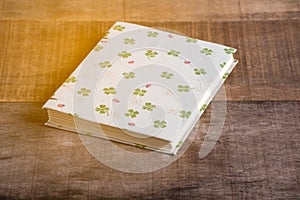 Closeup of handmade book on wooden background