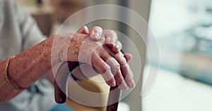 Closeup, hands and cane with old woman, support and relax with cancer, retirement and resting. Zoom, elderly lady and