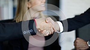 Closeup Hands. Caucasian Business handshake of business People deal business. Hold hand and shaking hand in office. Concept