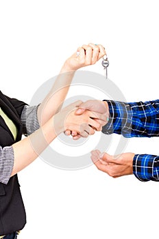 Closeup hands handing over key concept of buying