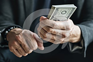 Closeup of hands holding cash