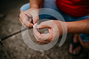 Closeup of hands holding a fishbait