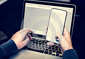 Closeup of hands holding mobile phone