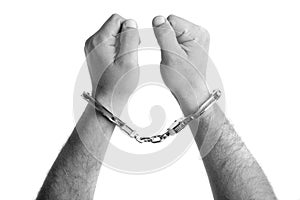 Closeup of the hands of a man with handcuffs