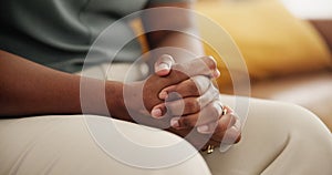 Closeup, hands and person with anxiety or stress on sofa for mental health issue, depression and nervous in home