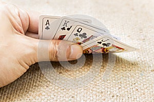 Closeup of hands with playing cards