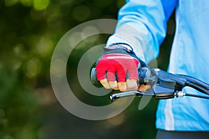 Closeup of hands in red protective gloves