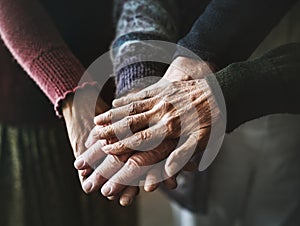 Closeup of hands of senior people photo
