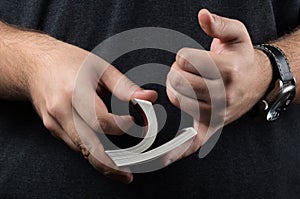 Closeup of hands shuffling cards