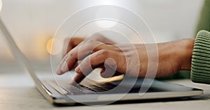 Closeup, hands and typing on a laptop keyboard for communication, online business or website. Zoom, table and a worker