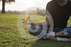 Closeup of hands woman doing yoga relax outdoor, female fitness pose focus and meditation for fitness club lifestyle outdoor